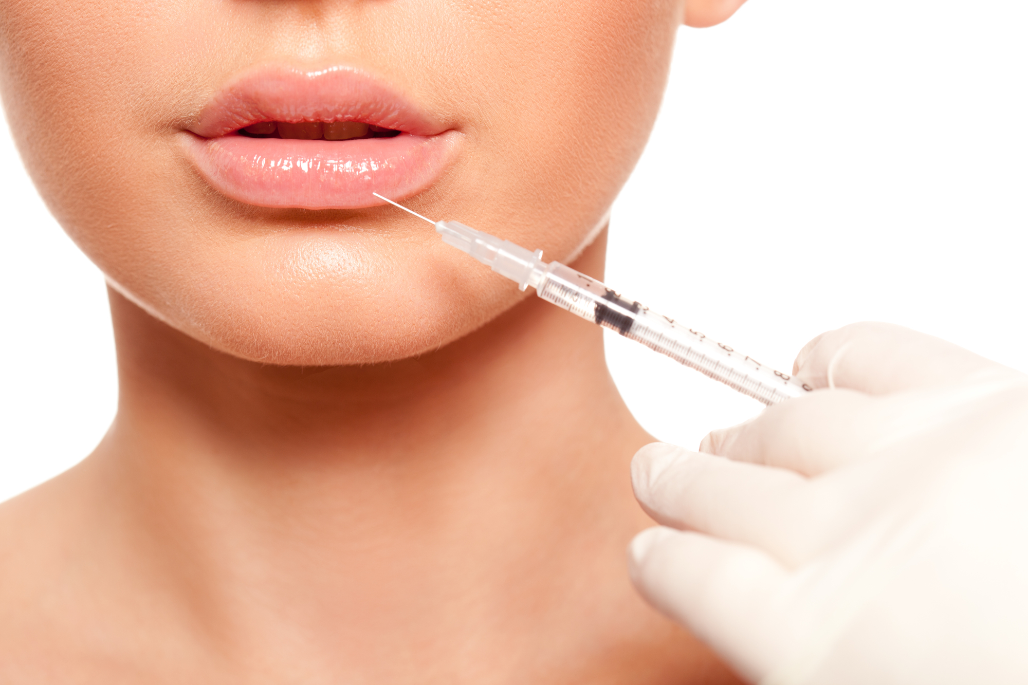 closeup beautiful woman face, syringe injection to lips beauty concept
